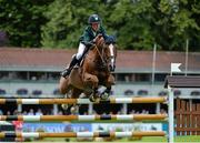 8 August 2013; Bertram Allen, Ireland, competing on Romonov, on his way to having a clear round during the Serpentine Speed Stakes. Discover Ireland Dublin Horse Show 2013, RDS, Ballsbridge, Dublin. Picture credit: Barry Cregg / SPORTSFILE