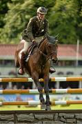 8 August 2013; Captain Michael Kelly, Ireland, competing on Annestown, on his way to having a clear round during the Serpentine Speed Stakes. Discover Ireland Dublin Horse Show 2013, RDS, Ballsbridge, Dublin. Picture credit: Barry Cregg / SPORTSFILE