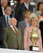 9 August 2013; The President of Ireland Michael D. Higgins and his wife Sabina stand for the National Anthem ahead of the Furusiyya FEI Nations Cup. Discover Ireland Dublin Horse Show 2013, RDS, Ballsbridge, Dublin. Picture credit: Barry Cregg / SPORTSFILE