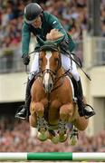 9 August 2013; Conor Swail, Ireland, competing on Lansdowne, during the Furusiyya FEI Nations Cup. Discover Ireland Dublin Horse Show 2013, RDS, Ballsbridge, Dublin. Picture credit: Barry Cregg / SPORTSFILE