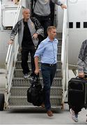 9 August 2013; Former Liverpool footballer Jason McAteer arrives with the rest of the Liverpool squad on their arrival in Dublin Airport ahead of the Dublin Decider against Glasgow Celtic on Saturday. Dublin Airport, Dublin. Picture credit: Brendan Moran / SPORTSFILE