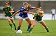 10 August 2013; Aideen Guy, Meath, in action against Ciara Burke, Laois. TG4 All-Ireland Ladies Football Senior Championship, Round 2, Qualifier, Laois v Meath, St. Brendan’s Park, Birr, Co. Offaly. Photo by Sportsfile