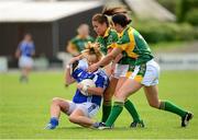 10 August 2013; Martina Dunne, Laois, in action against Aedin Murray and Julianne Scanlon, right, Meath. TG4 All-Ireland Ladies Football Senior Championship, Round 2, Qualifier, Laois v Meath, St. Brendan’s Park, Birr, Co. Offaly. Photo by Sportsfile