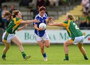 10 August 2013; Maggie Murphy, Laois, in action against Emma Troy, left, and Eileen Rahill, Meath. TG4 All-Ireland Ladies Football Senior Championship, Round 2, Qualifier, Laois v Meath, St. Brendan’s Park, Birr, Co. Offaly. Photo by Sportsfile