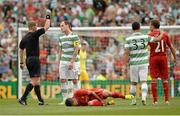 10 August 2013; Anthony Stokes, Glasgow Celtic XI, receives a yellow card from referee Alan Kelly after a foul on Philippe Coutinho, Liverpool XI. Dublin Decider, Liverpool XI v Glasgow Celtic XI, Aviva Stadium, Lansdowne Road, Dublin. Picture credit: Oliver McVeigh / SPORTSFILE