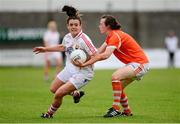 10 August 2013; Doireann O'Sullivan, Cork, in action against Sarah Marley, Armagh. TG4 All-Ireland Ladies Football Senior Championship, Round 2, Qualifier, Armagh v Cork, St. Brendan’s Park, Birr, Co. Offaly. Photo by Sportsfile