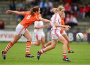 10 August 2013; Nollaig Cleary, Cork, in action against Caroline O'Hanlon, Armagh. TG4 All-Ireland Ladies Football Senior Championship, Round 2, Qualifier, Armagh v Cork, St. Brendan’s Park, Birr, Co. Offaly. Photo by Sportsfile
