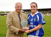 10 August 2013; Tracey Lawlor, Laois, is presented with the player of the match award by Pat Quill, President of the Ladies Gaelic Football Association. TG4 All-Ireland Ladies Football Senior Championship, Round 2, Qualifier, Laois v Meath, St. Brendan’s Park, Birr, Co. Offaly. Photo by Sportsfile