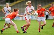 10 August 2013; Angela Walsh, Cork, in action against Niamh Marley, left, and Mairead Tennyson, Armagh. TG4 All-Ireland Ladies Football Senior Championship, Round 2, Qualifier, Armagh v Cork, St. Brendan’s Park, Birr, Co. Offaly. Photo by Sportsfile
