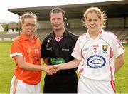 10 August 2013; Armagh captain Mags McAlinden shakes hands with Cork captain Ann Marie Walsh alongside referee Sean Joy before the start of the game. TG4 All-Ireland Ladies Football Senior Championship, Round 2, Qualifier, Armagh v Cork, St. Brendan’s Park, Birr, Co. Offaly. Photo by Sportsfile
