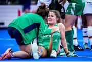 6 July 2022; Sarah Torrans of Ireland receives medical treatment during the FIH Women's Hockey World Cup Pool A match between Ireland and Germany at Wagener Stadium in Amstelveen, Netherlands. Photo by Jeroen Meuwsen/Sportsfile