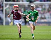 3 July 2022; Alan O'Connor, Scoil Náisiúnta Naomh Eirc, Ard Fhearta, Ciarraí, representing Limerick, in action against Calum Galvin, St Patrick's NS, Diswellstown Raod, Castleknock, Dublin, representing Galway, during the INTO Cumann na mBunscol GAA Respect Exhibition Go Games before the GAA Hurling All-Ireland Senior Championship Semi-Final match between Limerick and Galway at Croke Park in Dublin. Photo by Sam Barnes/Sportsfile