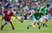 3 July 2022; Matt Cronin, Scoil Treasa Naofa, Cill Floinn, Ciarraí, representing Limerick, in action against Isaac Hassett, Scoil na Mainistreach, Quin, Clare, representing Galway, during the INTO Cumann na mBunscol GAA Respect Exhibition Go Games before the GAA Hurling All-Ireland Senior Championship Semi-Final match between Limerick and Galway at Croke Park in Dublin. Photo by Sam Barnes/Sportsfile