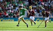 3 July 2022; Matt Cronin, Scoil Treasa Naofa, Cill Floinn, Ciarraí, representing Limerick, in action against Dáithí O'Reilly, Clea PS, Keady, Armagh, representing Galway, during the INTO Cumann na mBunscol GAA Respect Exhibition Go Games before the GAA Hurling All-Ireland Senior Championship Semi-Final match between Limerick and Galway at Croke Park in Dublin. Photo by Sam Barnes/Sportsfile