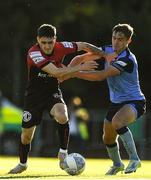 7 July 2022; Dawson Devoy of Bohemians in action against Evan Caffrey of UCD during the SSE Airtricity League Premier Division match between UCD and Bohemians at UCD Bowl in Belfield, Dublin. Photo by George Tewkesbury/Sportsfile