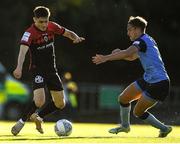 7 July 2022; Dawson Devoy of Bohemians in action against Evan Caffrey of UCD during the SSE Airtricity League Premier Division match between UCD and Bohemians at UCD Bowl in Belfield, Dublin. Photo by George Tewkesbury/Sportsfile