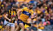 2 July 2022; Cathal Malone of Clare passes under pressure from Walter Walsh of Kilkenny during the GAA Hurling All-Ireland Senior Championship Semi-Final match between Kilkenny and Clare at Croke Park in Dublin. Photo by Piaras Ó Mídheach/Sportsfile