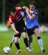 7 July 2022; Dawson Devoy of Bohemians in action against Donal Higgins of UCD during the SSE Airtricity League Premier Division match between UCD and Bohemians at UCD Bowl in Belfield, Dublin. Photo by George Tewkesbury/Sportsfile