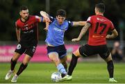 7 July 2022; Dara Keane of UCD in action against Max Murphy, left and Ryan Cassidy of Bohemians during the SSE Airtricity League Premier Division match between UCD and Bohemians at UCD Bowl in Belfield, Dublin. Photo by George Tewkesbury/Sportsfile
