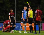 7 July 2022; Referee Alan Patchell shows Sam Todd of UCD his second yellow during the SSE Airtricity League Premier Division match between UCD and Bohemians at UCD Bowl in Belfield, Dublin. Photo by George Tewkesbury/Sportsfile