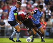 7 July 2022; Junior Ogedi-Uzokwe of Bohemians is fouled by Jack Keaney, left and Evan Osam of UCD during the SSE Airtricity League Premier Division match between UCD and Bohemians at UCD Bowl in Belfield, Dublin. Photo by George Tewkesbury/Sportsfile