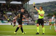 5 July 2022; Joseph Zerafa of Hibernians is shown a yellow card by referee Morten Krogh during the UEFA Champions League 2022/23 First Qualifying Round First Leg match between Shamrock Rovers and Hibernians at Tallaght Stadium in Dublin. Photo by Stephen McCarthy/Sportsfile