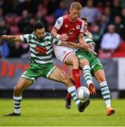 27 June 2022; Eoin Doyle of St Patrick's Athletic in action against Roberto Lopes, left, and Lee Grace of Shamrock Rovers during the SSE Airtricity League Premier Division match between St Patrick's Athletic and Shamrock Rovers at Richmond Park in Dublin. Photo by Piaras Ó Mídheach/Sportsfile