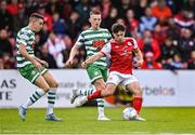 27 June 2022; Adam O'Reilly of St Patrick's Athletic in action against Gary O'Neill, left, and Andy Lyons of Shamrock Rovers during the SSE Airtricity League Premier Division match between St Patrick's Athletic and Shamrock Rovers at Richmond Park in Dublin. Photo by Piaras Ó Mídheach/Sportsfile