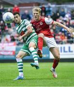 27 June 2022; Aaron Greene of Shamrock Rovers in action against Tom Grivosti of St Patrick's Athletic during the SSE Airtricity League Premier Division match between St Patrick's Athletic and Shamrock Rovers at Richmond Park in Dublin. Photo by Piaras Ó Mídheach/Sportsfile