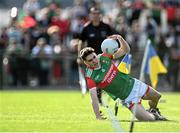 8 July 2022; Jack Keane of Mayo tries to keep the ball in play during the Electric Ireland GAA Football All-Ireland Minor Championship Final match between Galway and Mayo at Dr Hyde Park in Roscommon. Photo by Piaras Ó Mídheach/Sportsfile