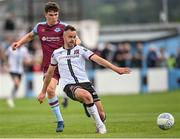 8 July 2022; Robbie Benson of Dundalk in action against James Clarke of Drogheda United during the SSE Airtricity League Premier Division match between Drogheda United and Dundalk at Head in the Game Park in Drogheda, Louth. Photo by Ramsey Cardy/Sportsfile