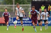 8 July 2022; Daniel Kelly of Dundalk in action against Dayle Rooney of Drogheda United during the SSE Airtricity League Premier Division match between Drogheda United and Dundalk at Head in the Game Park in Drogheda, Louth. Photo by Ramsey Cardy/Sportsfile