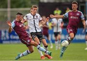 8 July 2022; Daniel Kelly of Dundalk is tackled by Luke Heeney of Drogheda United during the SSE Airtricity League Premier Division match between Drogheda United and Dundalk at Head in the Game Park in Drogheda, Louth. Photo by Ramsey Cardy/Sportsfile