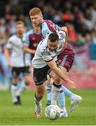8 July 2022; Robbie Benson of Dundalk in action against Darragh Nugent of Drogheda United during the SSE Airtricity League Premier Division match between Drogheda United and Dundalk at Head in the Game Park in Drogheda, Louth. Photo by Ramsey Cardy/Sportsfile