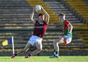 8 July 2022; Fionn O'Connor of Galway in action against Rio Mortimer of Mayo during the Electric Ireland GAA Football All-Ireland Minor Championship Final match between Galway and Mayo at Dr Hyde Park in Roscommon. Photo by Piaras Ó Mídheach/Sportsfile