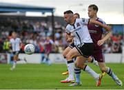 8 July 2022; Robbie Benson of Dundalk in action against Andrew Quinn of Drogheda United during the SSE Airtricity League Premier Division match between Drogheda United and Dundalk at Head in the Game Park in Drogheda, Louth. Photo by Ramsey Cardy/Sportsfile