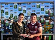 8 July 2022; Tomás Farthing of Galway is presented with the Electric Ireland Best & Fairest Award by Sinéad Kilkelly of Electric Ireland after the Electric Ireland GAA Football All-Ireland Minor Championship Final match between Galway and Mayo at Dr Hyde Park in Roscommon. Photo by Piaras Ó Mídheach/Sportsfile