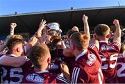 8 July 2022; Galway players celebrate with the Tom Markham cup after their side's victory in the Electric Ireland GAA Football All-Ireland Minor Championship Final match between Galway and Mayo at Dr Hyde Park in Roscommon. Photo by Piaras Ó Mídheach/Sportsfile