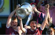 8 July 2022; Galway joint-captains Jack Lonergan, left, and Éanna Monaghan lift the Tom Markham cup after their side's victory in the Electric Ireland GAA Football All-Ireland Minor Championship Final match between Galway and Mayo at Dr Hyde Park in Roscommon. Photo by Piaras Ó Mídheach/Sportsfile