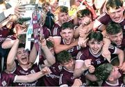 8 July 2022; Shay McGlinchey of Galway holds up the Tom Markham cup during the celebrations after his side's victory in the Electric Ireland GAA Football All-Ireland Minor Championship Final match between Galway and Mayo at Dr Hyde Park in Roscommon. Photo by Piaras Ó Mídheach/Sportsfile