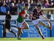 8 July 2022; Fionn O'Connor of Galway in action against Paul Gimore of Mayo during the Electric Ireland GAA Football All-Ireland Minor Championship Final match between Galway and Mayo at Dr Hyde Park in Roscommon. Photo by Piaras Ó Mídheach/Sportsfile