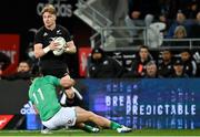 9 July 2022; Jordie Barrett of New Zealand is tackled by James Lowe of Ireland during the Steinlager Series match between New Zealand and Ireland at the Forsyth Barr Stadium in Dunedin, New Zealand. Photo by Brendan Moran/Sportsfile