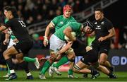 9 July 2022; Caelan Doris of Ireland is tackled by Scott Barrett of New Zealand during the Steinlager Series match between New Zealand and Ireland at the Forsyth Barr Stadium in Dunedin, New Zealand. Photo by Brendan Moran/Sportsfile