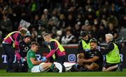 9 July 2022; Garry Ringrose of Ireland and Angus Ta'avao of New Zealand are treated by medical staff after a collision, resulting in a red card for Angus Ta'avao, during the Steinlager Series match between New Zealand and Ireland at the Forsyth Barr Stadium in Dunedin, New Zealand. Photo by Brendan Moran/Sportsfile