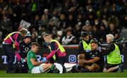 9 July 2022; Garry Ringrose of Ireland and Angus Ta'avao of New Zealand are treated by medical staff after a collision, resulting in a red card for Angus Ta'avao, during the Steinlager Series match between New Zealand and Ireland at the Forsyth Barr Stadium in Dunedin, New Zealand. Photo by Brendan Moran/Sportsfile