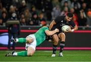9 July 2022; Richie Mo'unga of New Zealand is tackled by Robbie Henshaw of Ireland during the Steinlager Series match between New Zealand and Ireland at the Forsyth Barr Stadium in Dunedin, New Zealand. Photo by Brendan Moran/Sportsfile