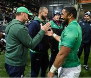 9 July 2022; Bundee Aki of Ireland, right, with Ireland assistant coach Mike Catt after their side's victory in the Steinlager Series match between New Zealand and Ireland at the Forsyth Barr Stadium in Dunedin, New Zealand. Photo by Brendan Moran/Sportsfile