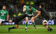 9 July 2022; Robbie Henshaw of Ireland is tackled by Aaron Smith, left, and Ardie Savea of New Zealand during the Steinlager Series match between the New Zealand and Ireland at the Forsyth Barr Stadium in Dunedin, New Zealand. Photo by Brendan Moran/Sportsfile