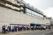 9 July 2022; Supporters queue outside the stadium before the Tailteann Cup Final match between Cavan and Westmeath at Croke Park in Dublin. Photo by Ramsey Cardy/Sportsfile
