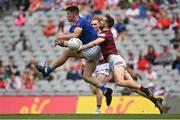9 July 2022; James Smith of Cavan in action against Kevin Maguire of Westmeath during the Tailteann Cup Final match between Cavan and Westmeath at Croke Park in Dublin. Photo by Seb Daly/Sportsfile